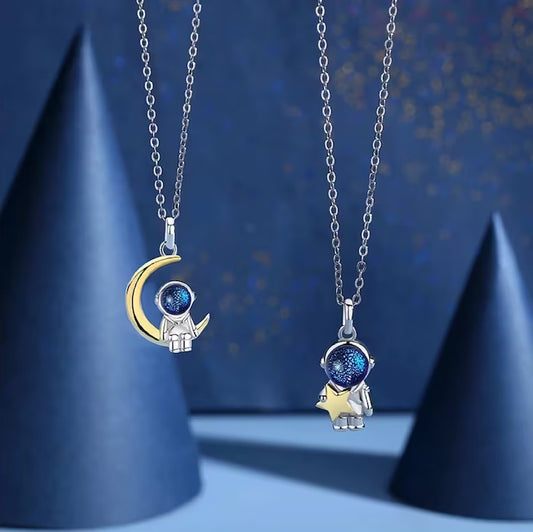 Adorable astronaut necklace. Astronaut pendant sitting on the moon or with a star. Sterling silver 925. Gift for women and couples