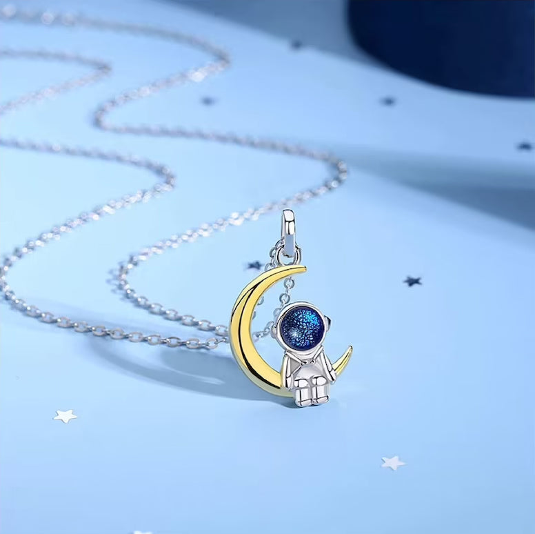 Adorable astronaut necklace. Astronaut pendant sitting on the moon or with a star. Sterling silver 925. Gift for women and couples